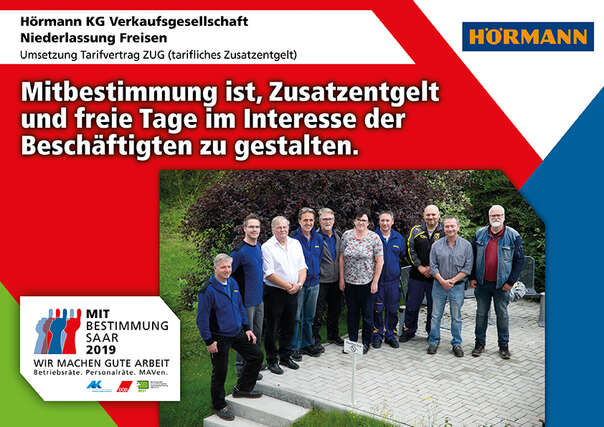 Ausstellerplakat Hörmann KG, Niederlassung Freisen: Umsetzung Tarifvertrag ZUG (tarifliches Zusatzentgelt)