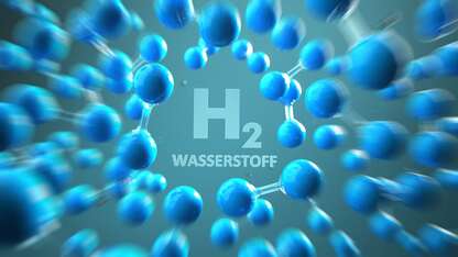 Schriftzug H2 Wasserstoff, blauer Hintergrund und viele Moleküle, Adobe Stock Foto